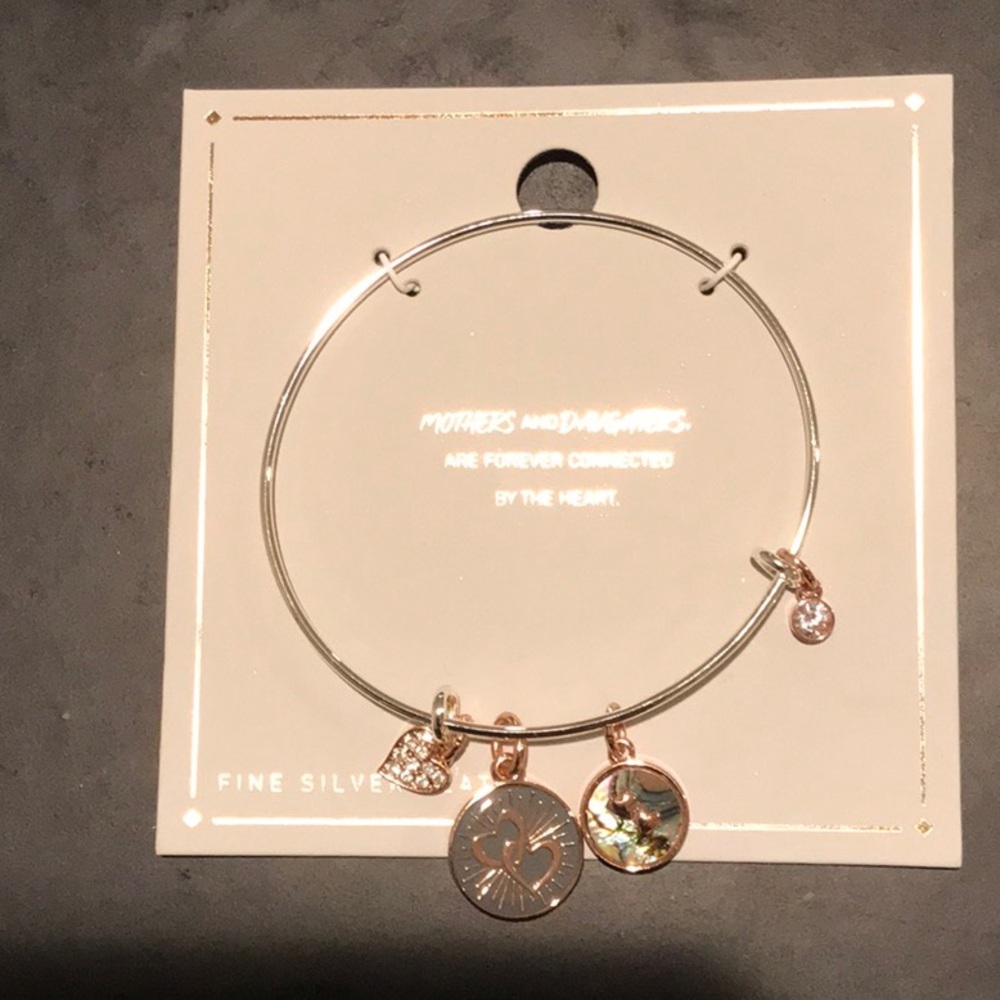 Mothers and daughters are forever connected by the heart bracelet